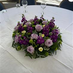 Purple and green table centre piece 