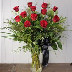 The Dozen Red Freedom rose vase Arrangement 