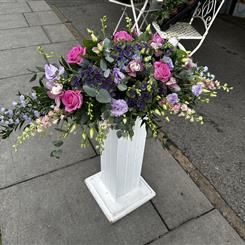 Pink and purple low and low arrangement 
