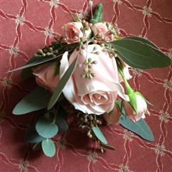 Pink foliage buttonhole 