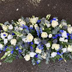 Blue and white casket spray 