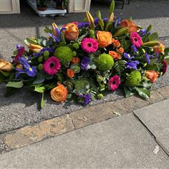  Vibrant casket spray 