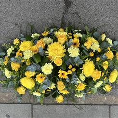 All yellow casket spray 